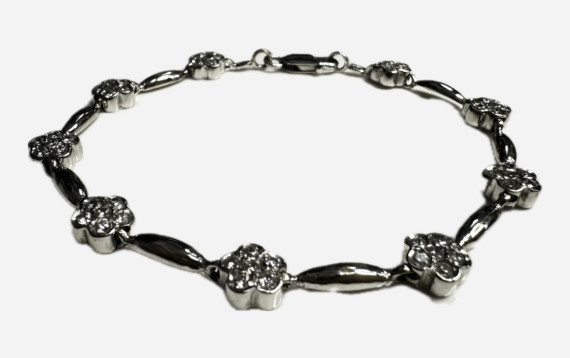 8-7-73850-2-Pulsera semirígida flores circonitas de oro blanco 18K