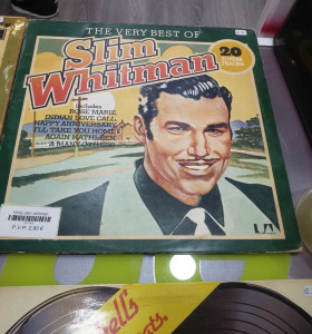 7-7-61963-1-Vinilo slim whitman