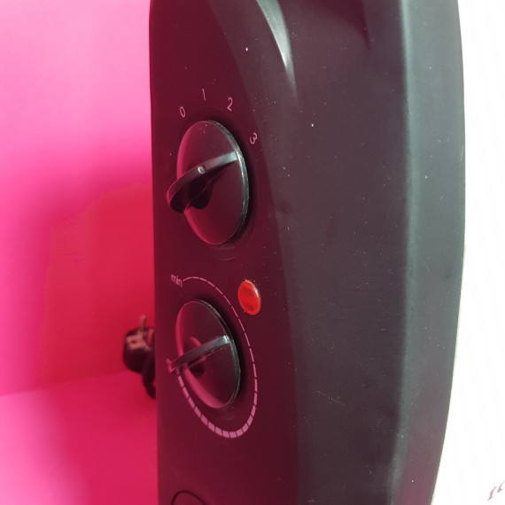 8-8-68571-2-Radiador Electrico Taurus Clima 2000w