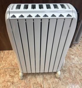 1-1-267311-1-Radiador Electrico De Longui 7 Elementos 2