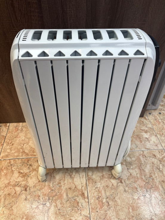 1-1-267311-2-Radiador Electrico De Longui 7 Elementos