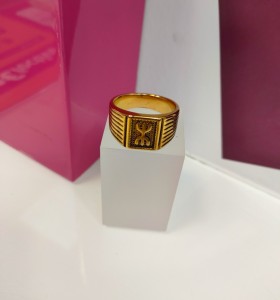 9-9-75634-1-Anillo acero dorado con simbolo bereber T27