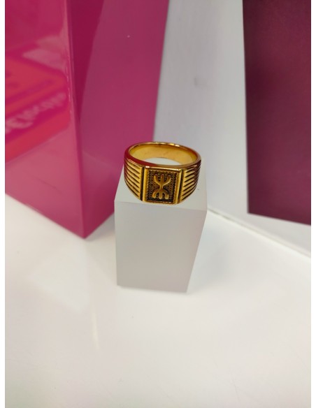 9-9-75634-1-Anillo acero dorado con simbolo bereber T27