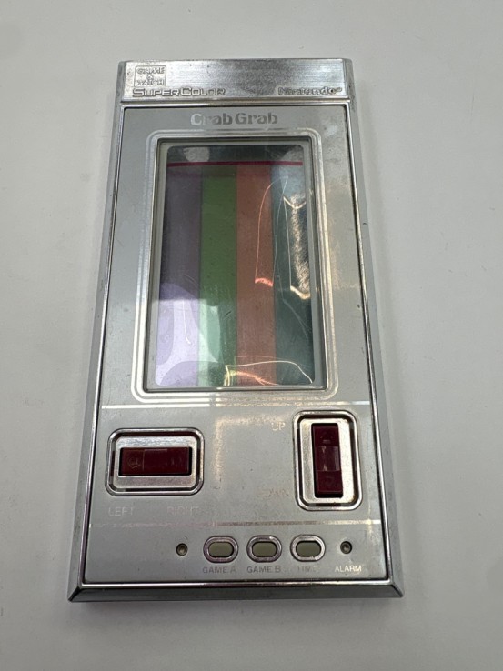 1-1-273065-1-Videojuego Maquinita Crab Grab Game Watch Super Color Año 1984 Nintendo 