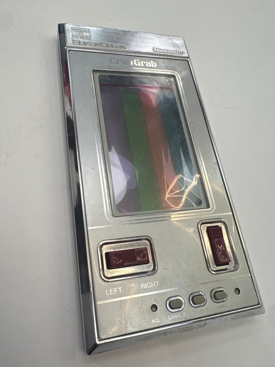 1-1-273065-5-Videojuego Maquinita Crab Grab Game Watch Super Color Año 1984 Nintendo 