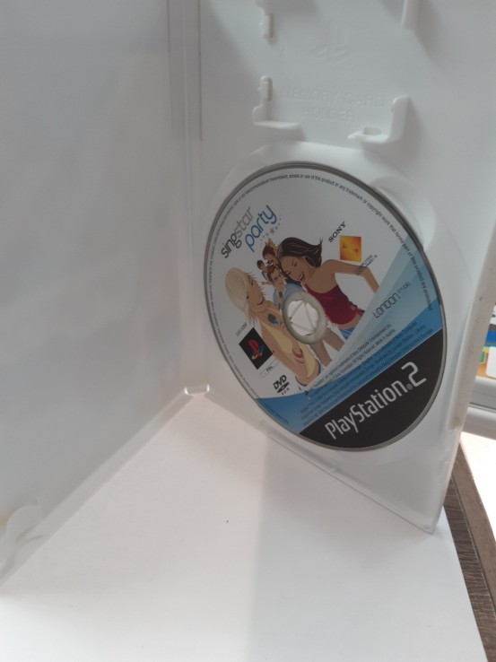 1-1-228897-1-Videojuego PS2 Singstar Party 