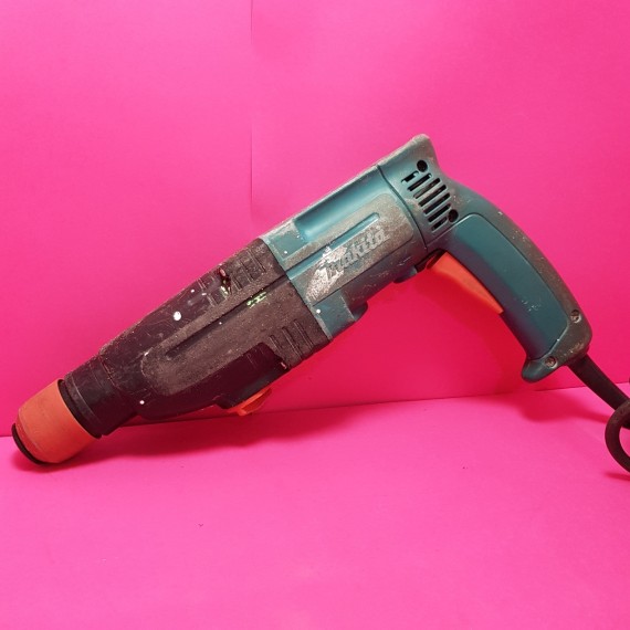 1-8-65765-1-Taladro Percutor Makita HR2410 sin garantia