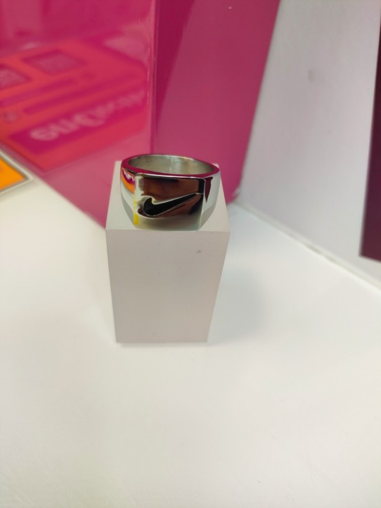 9-9-75631-1-Anillo acero plateado con simbolo de nike T25