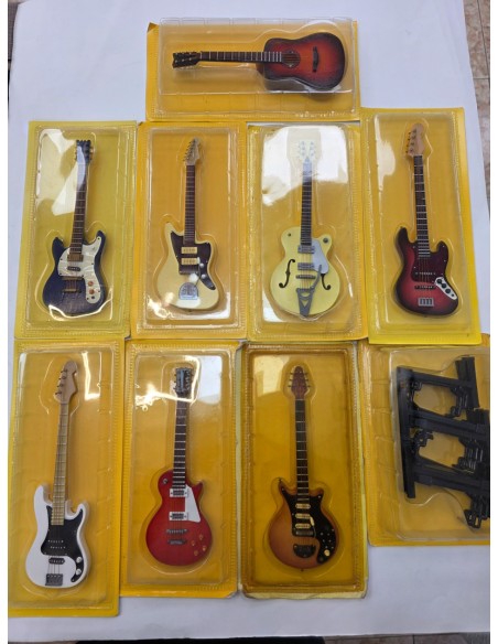 1-1-277133-1-Instrumentos Musicales En Miniatura Pack 8 Guitarras Mini Soporte